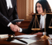 Civil lawyer discussing ancestral property partition case in Delhi with clients